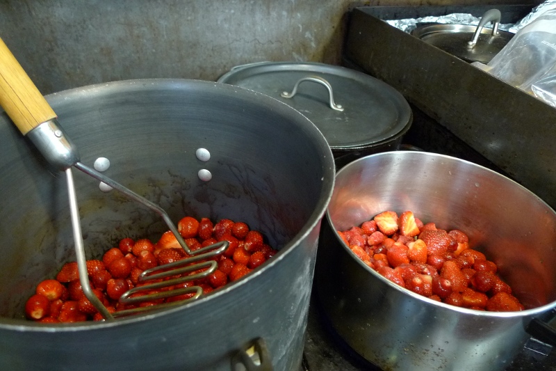 mashing and cooking the berries